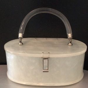 White marble and clear lucite bag